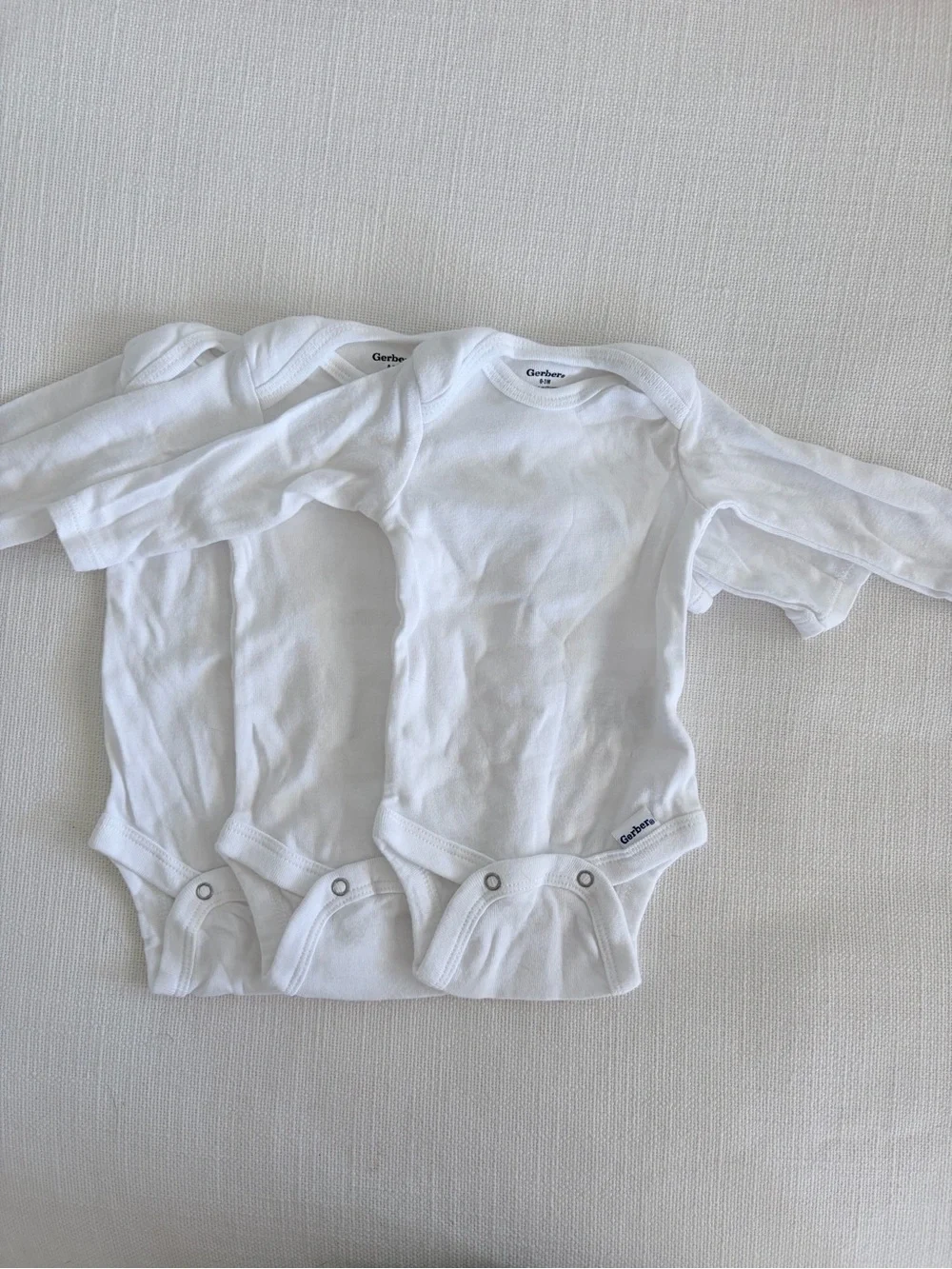 Gerber White Long-Sleeve Baby One-Piece Bodysuits - 3 Pack
